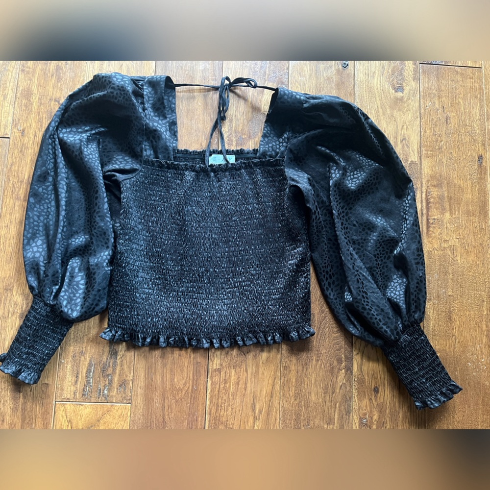 The tag says She + Sky I got this from a boutique in Nashville